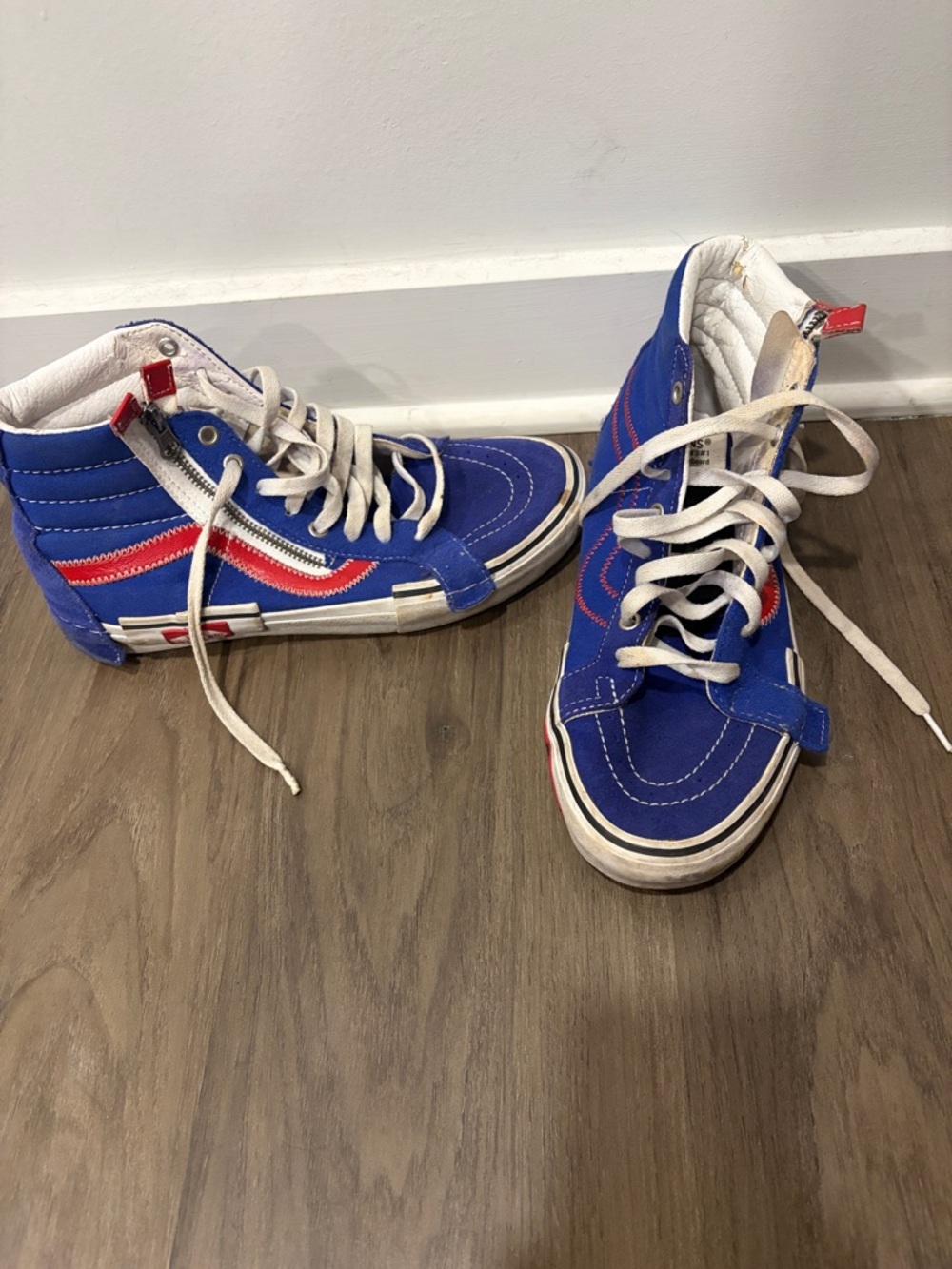 Vans High-Top Sneakers in Blue with Red Stripe